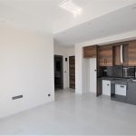 Квартира 1+1 с видом на море в районе Махмутлар, Аланья