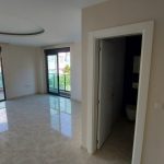 Квартира 1+1 на первой линии в Каргыджаке, Аланья