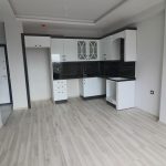 Двухкомнатная квартира в новом комплексе в районе Арпачбахшиш