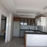 Апартаменты 2+1 с чистовой отделкой в районе Томюк